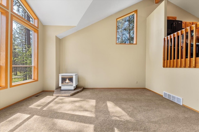 14512 N Dartford Dr, Spokane, WA 99208 - spare room featuring carpet flooring, baseboards, and lofted ceiling
