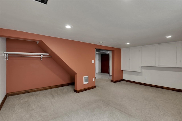 1308 W 11th Ave, Spokane, WA 99204 - below grade area featuring light colored carpet, recessed lighting, and baseboards