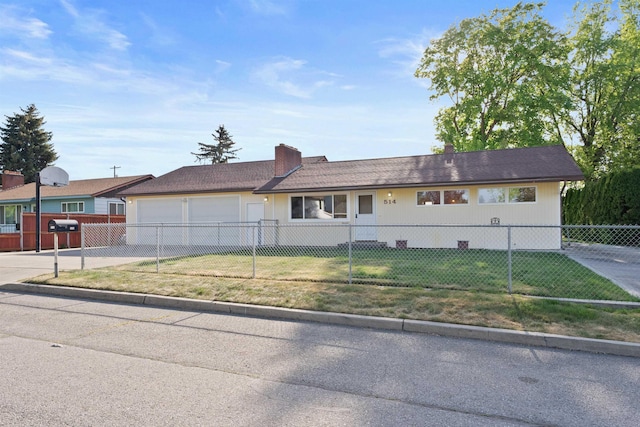 ranch-style home featuring driveway and a garage