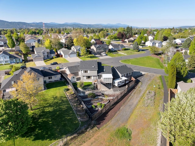 aerial perspective of suburban area featuring a mountainous background