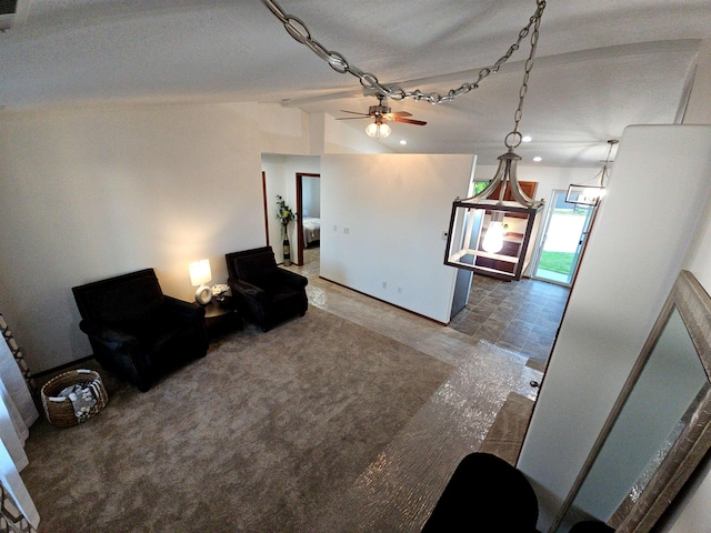 living area featuring a ceiling fan, lofted ceiling, and recessed lighting