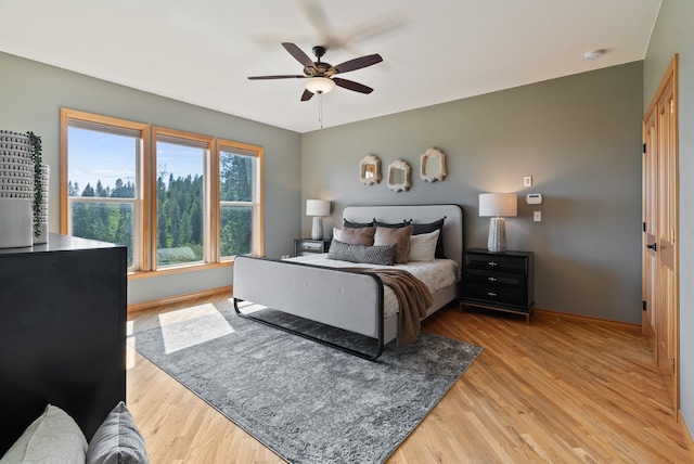 18707 E Terrapin Ln, Otis Orchards, WA 99027 - bedroom featuring wood finished floors and ceiling fan