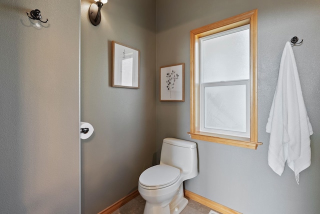 18707 E Terrapin Ln, Otis Orchards, WA 99027 - bathroom featuring toilet and baseboards