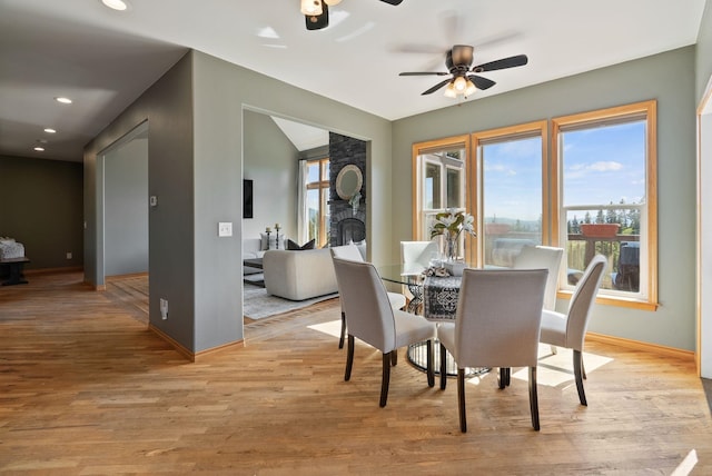 18707 E Terrapin Ln, Otis Orchards, WA 99027 - dining area with baseboards, a ceiling fan, light wood finished floors, and recessed lighting