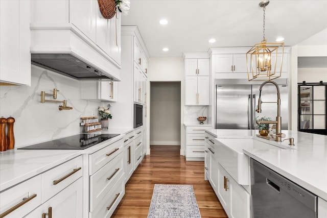 15921 W Four Mound Rd, Nine Mile Falls, WA 99026 - kitchen with built in appliances, a sink, open shelves, a chandelier, and recessed lighting