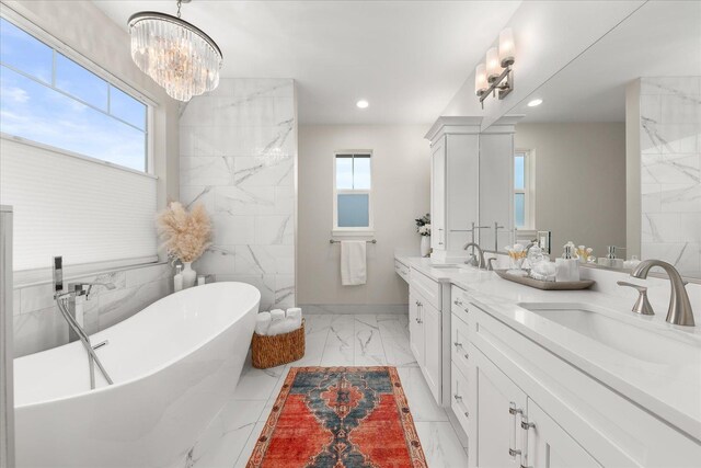 15921 W Four Mound Rd, Nine Mile Falls, WA 99026 - kitchen with appliances with stainless steel finishes, recessed lighting, white cabinetry, light wood-style floors, and a sink