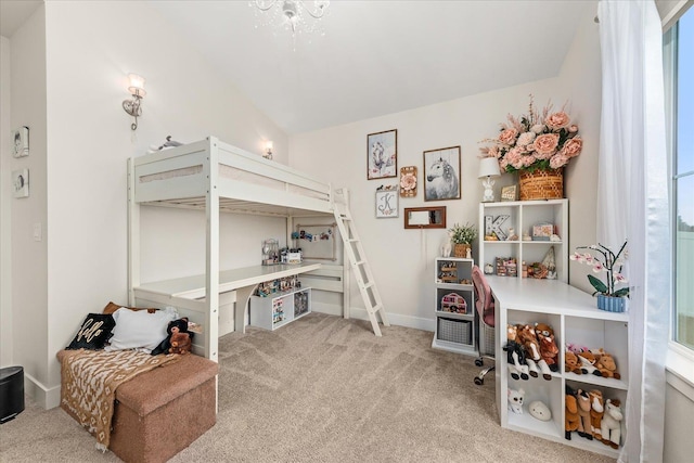 15921 W Four Mound Rd, Nine Mile Falls, WA 99026 - bedroom with a barn door, carpet floors, and baseboards