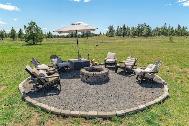 15921 W Four Mound Rd, Nine Mile Falls, WA 99026 - view of front of house featuring central AC unit, concrete driveway, a front lawn, board and batten siding, and a garage