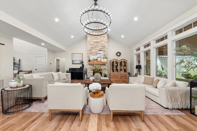 15921 W Four Mound Rd, Nine Mile Falls, WA 99026 - entrance foyer with a barn door, a chandelier, light wood-type flooring, french doors, and recessed lighting