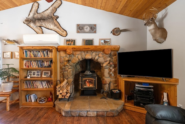 living area featuring an AC wall unit, lofted ceiling, wood ceiling, a wood stove, and wood finished floors