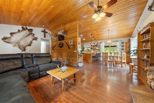 living room with wooden ceiling, a ceiling fan, a chandelier, wood finished floors, and vaulted ceiling