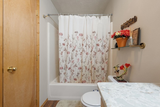 full bath with toilet, wood finished floors, shower / tub combo, and vanity