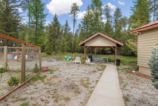 view of yard with a gazebo and a patio