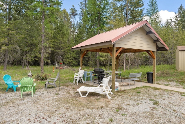 view of yard with a gazebo and a patio