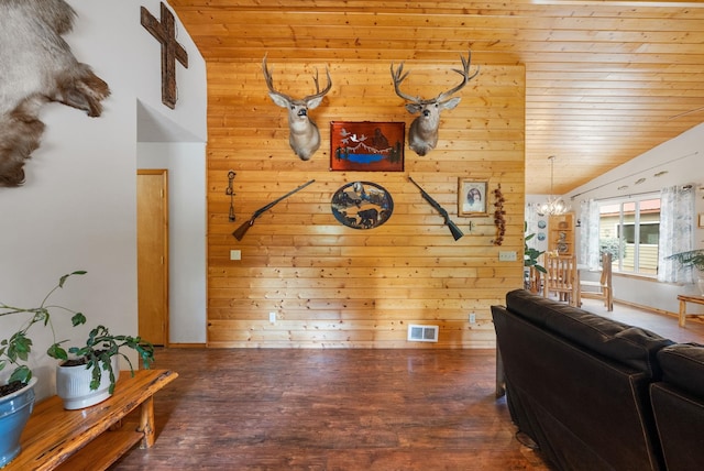 living room featuring vaulted ceiling, wood ceiling, wooden walls, wood finished floors, and baseboards