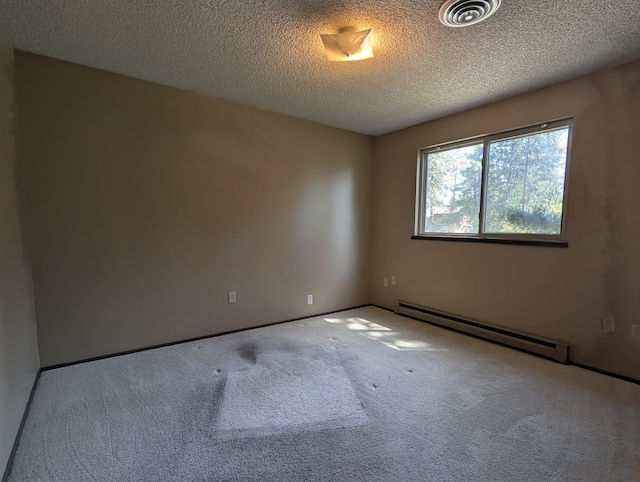unfurnished room with baseboard heating, carpet flooring, and a textured ceiling