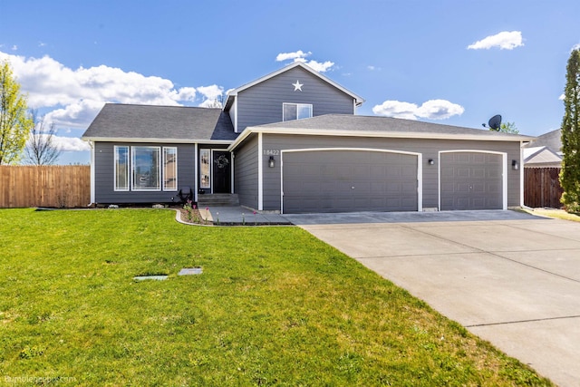 traditional-style home with a garage and concrete driveway