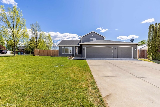 traditional home featuring an attached garage and driveway