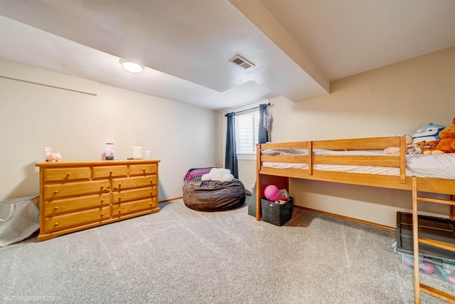 carpeted bedroom with baseboards