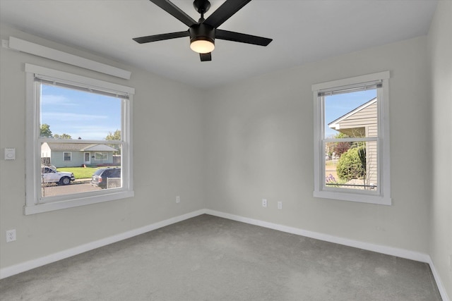 1207 E Garland Ave, Spokane, WA 99207 - spare room featuring carpet, baseboards, and ceiling fan
