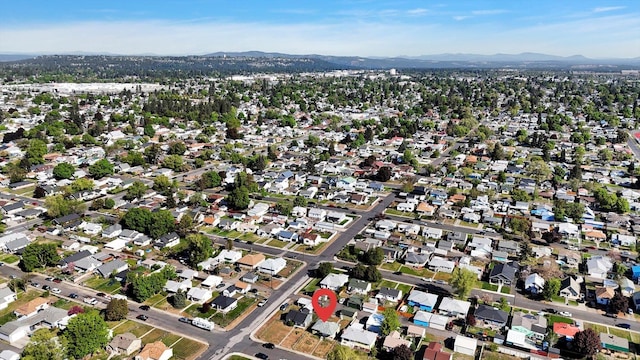 1207 E Garland Ave, Spokane, WA 99207 - aerial overview of property's location featuring a mountain backdrop
