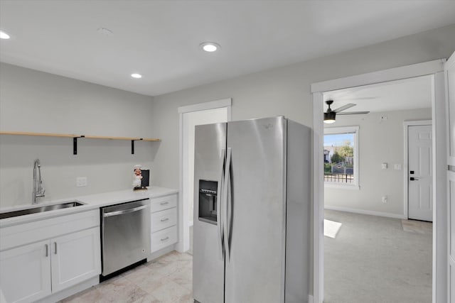 1207 E Garland Ave, Spokane, WA 99207 - kitchen with appliances with stainless steel finishes, open shelves, a sink, white cabinetry, and recessed lighting
