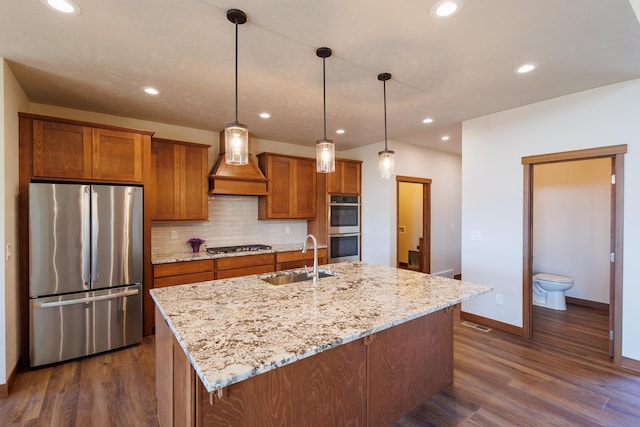 60874 Westview Dr, Nine Mile Falls, WA 99026 - kitchen with appliances with stainless steel finishes, a sink, custom range hood, dark wood-style floors, and recessed lighting