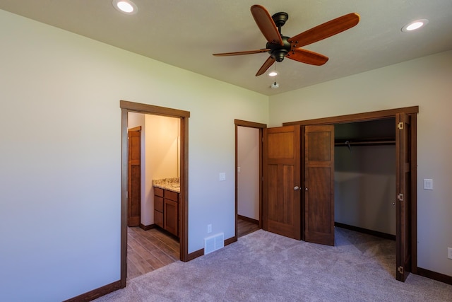 60874 Westview Dr, Nine Mile Falls, WA 99026 - unfurnished bedroom featuring carpet flooring, a closet, baseboards, recessed lighting, and connected bathroom