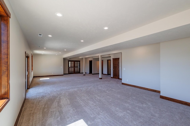 60874 Westview Dr, Nine Mile Falls, WA 99026 - unfurnished living room featuring light carpet, baseboards, and recessed lighting