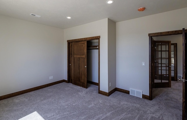 60874 Westview Dr, Nine Mile Falls, WA 99026 - unfurnished bedroom with carpet flooring, recessed lighting, baseboards, and a closet