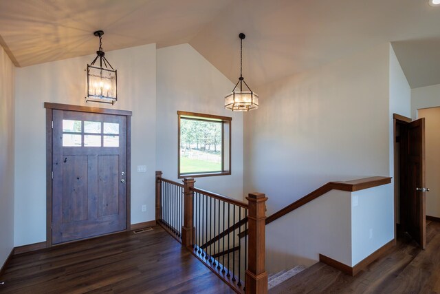 60874 Westview Dr, Nine Mile Falls, WA 99026 - entrance foyer with a chandelier, wood finished floors, baseboards, and high vaulted ceiling