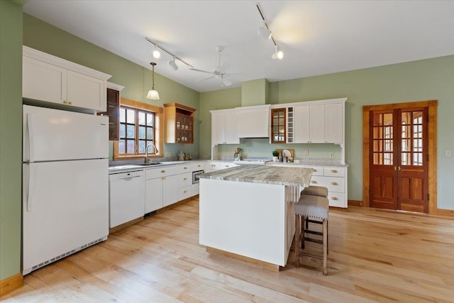 4408 E Spangle Creek Rd, Valleyford, WA 99036 - kitchen with white appliances, a ceiling fan, a sink, light wood-type flooring, and white cabinetry