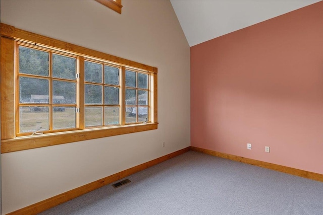 4408 E Spangle Creek Rd, Valleyford, WA 99036 - empty room featuring vaulted ceiling, carpet flooring, and baseboards