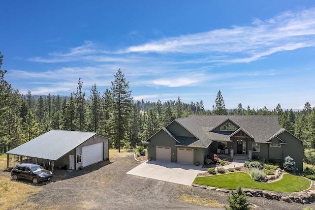 12715 E Deer Creek Rd, Chattaroy, WA 99003 - view of front of property with a view of trees, roof with shingles, driveway, and a garage