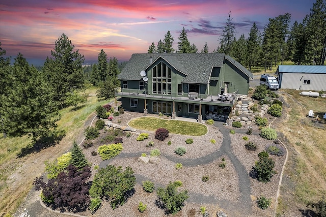 12715 E Deer Creek Rd, Chattaroy, WA 99003 - rear view of property with a patio