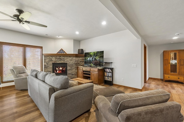 12715 E Deer Creek Rd, Chattaroy, WA 99003 - living room featuring ceiling fan, baseboards, light wood finished floors, a fireplace, and recessed lighting