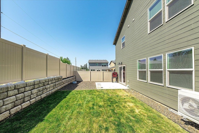 view of yard featuring a patio and ac unit