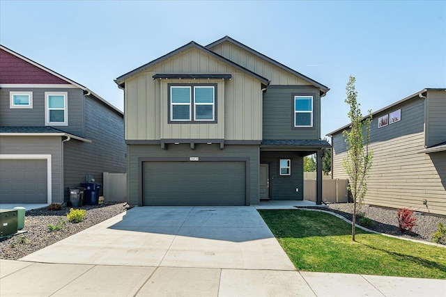 craftsman-style house with board and batten siding, an attached garage, and concrete driveway