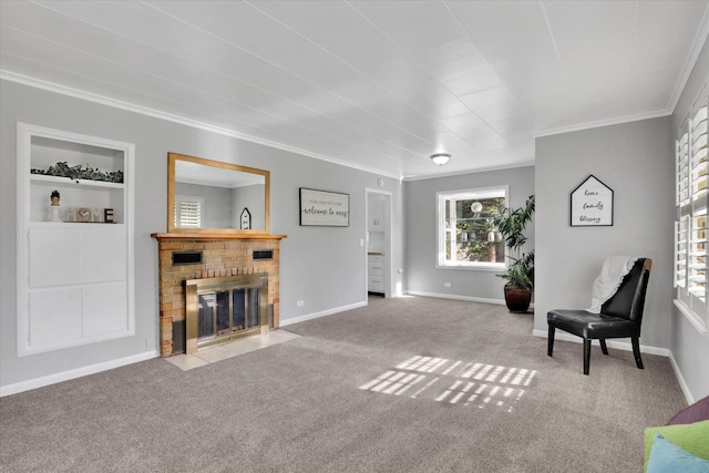 living area with ornamental molding, carpet, a fireplace, and baseboards