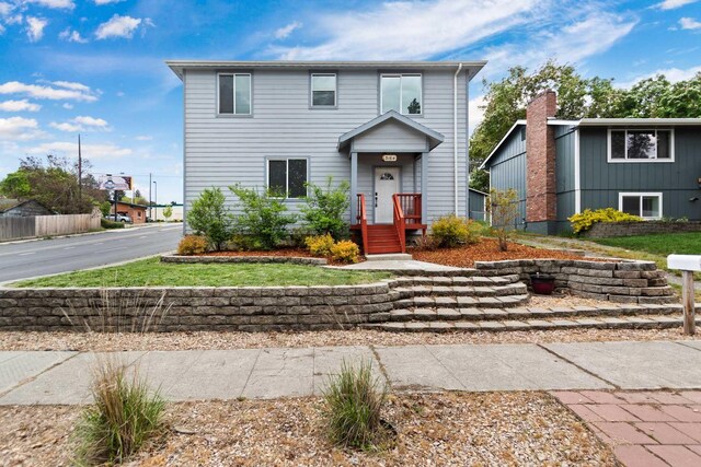 view of front of home with fence