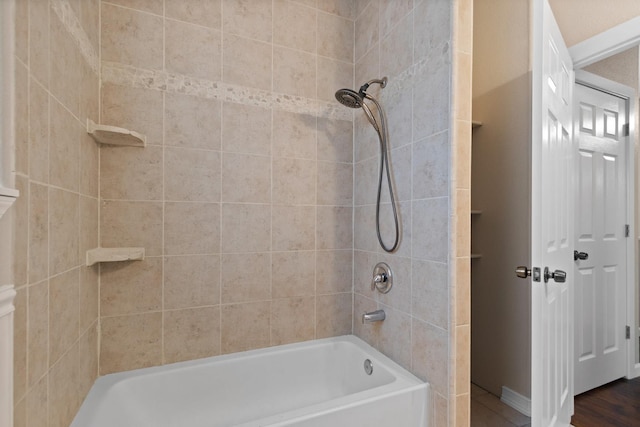 full bath featuring tub / shower combination