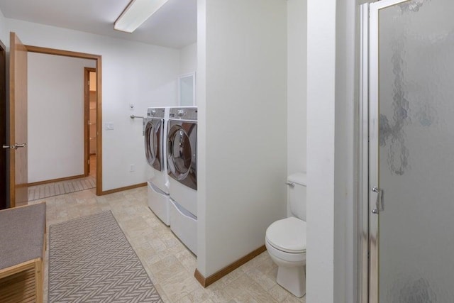 4414 Garden Spot Rd, Clayton, WA 99110 - bathroom with separate washer and dryer, toilet, a shower stall, and baseboards