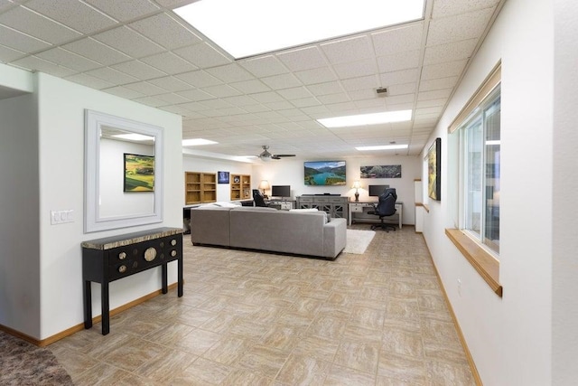 4414 Garden Spot Rd, Clayton, WA 99110 - living area featuring baseboards, a drop ceiling, a ceiling fan, and an office area