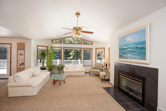 4414 Garden Spot Rd, Clayton, WA 99110 - living room with a tiled fireplace, lofted ceiling, a ceiling fan, dark carpet, and recessed lighting