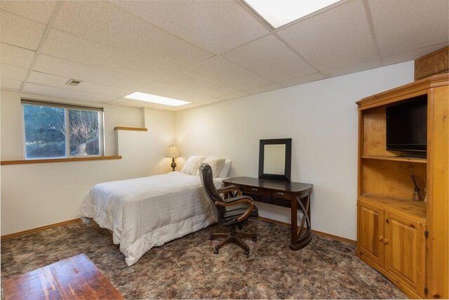 4414 Garden Spot Rd, Clayton, WA 99110 - carpeted bedroom featuring a paneled ceiling and baseboards