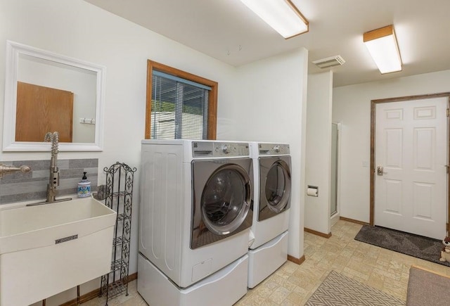 4414 Garden Spot Rd, Clayton, WA 99110 - laundry area with washer and dryer and baseboards