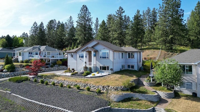 5612 N Vista Grande Dr, Otis Orchards, WA 99027 - view of front of house featuring a front lawn