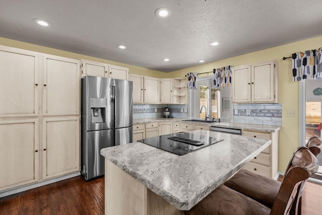 5612 N Vista Grande Dr, Otis Orchards, WA 99027 - kitchen featuring stainless steel fridge with ice dispenser, black electric cooktop, a sink, open shelves, and dark wood-style flooring