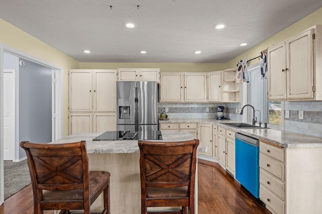 5612 N Vista Grande Dr, Otis Orchards, WA 99027 - kitchen with stainless steel fridge, a sink, dishwasher, dark wood-style flooring, and a kitchen island