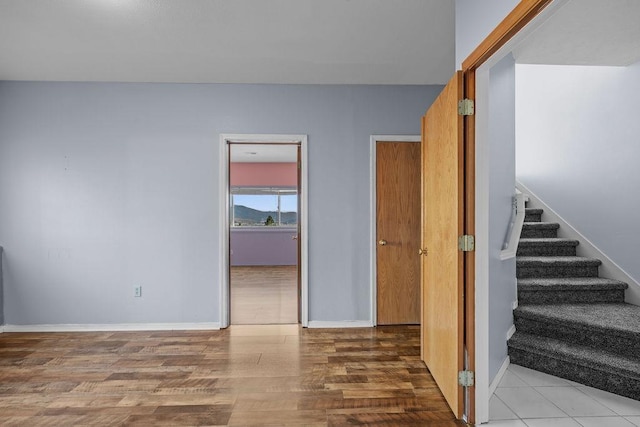 5612 N Vista Grande Dr, Otis Orchards, WA 99027 - staircase featuring wood finished floors and baseboards